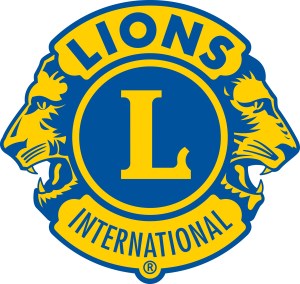 Logo of Lions International featuring two lion heads facing each other, with the word 'LIONS' above and 'INTERNATIONAL' below a central blue circle containing the letter 'L'.